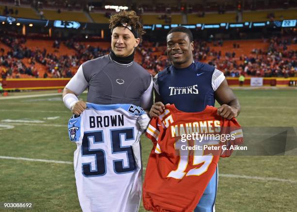 Quarterback Patrick Mahomes of the Kansas City Chiefs and linebacker Jayon Brown of the Tennessee Titans exchange jerseys after the game at Arrowhead...