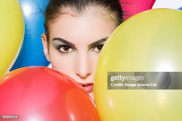 woman with balloons - static electricity stock pictures, royalty-free photos & images