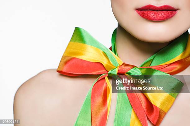 woman wearing bow - bow tie stock pictures, royalty-free photos & images