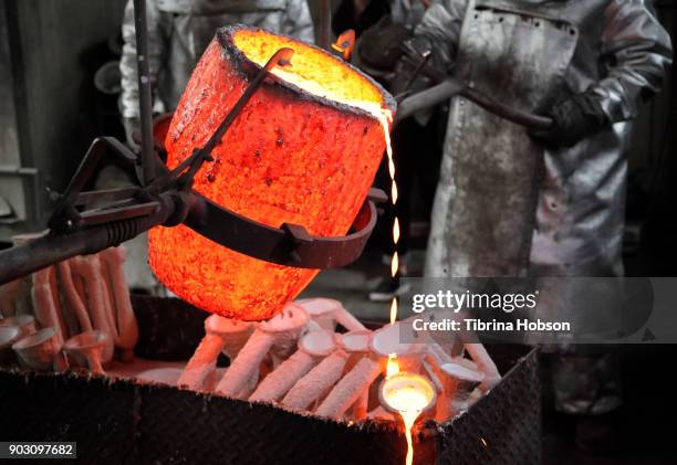 View of the casting and molding process during the pouring of the actor statuette for the 24th Annual Screen Actors Guild Awards at American Fine...