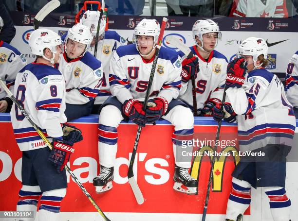 Ryan Poehling of United States takes a break on the boards during a TV timeout against the Czech Republic during the first period of play in the IIHF...