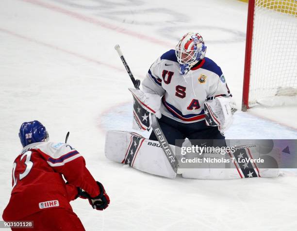 Jake Oettinger of United States makes a save on a shot from Jakub Galvas of Czech Republic during the first period of play in the IIHF World Junior...