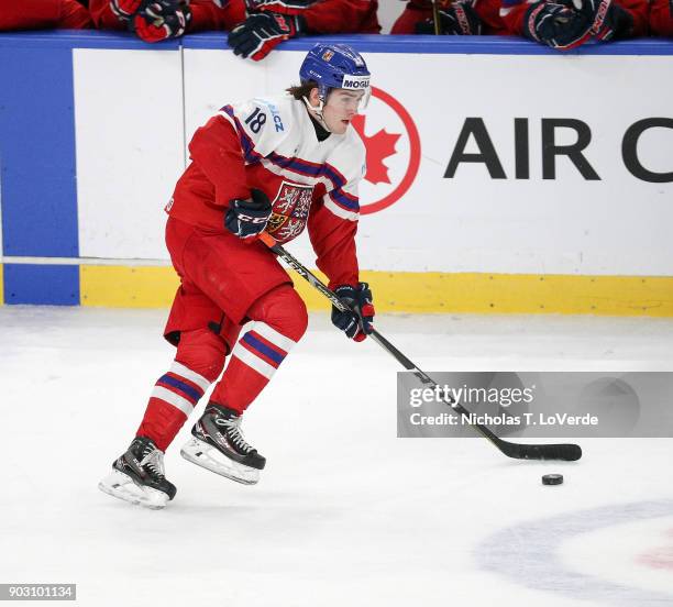 Filip Zadina of Czech Republic skates the puck up ice against the United States during the first period of play in the IIHF World Junior...