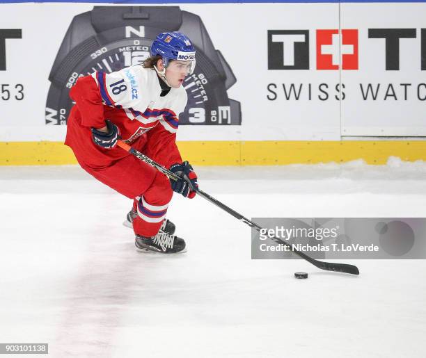 Filip Zadina of Czech Republic skates the puck up ice against the United States during the first period of play in the IIHF World Junior...