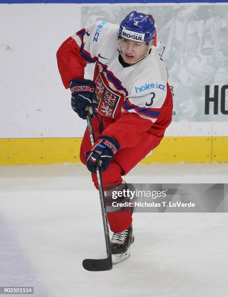 Libor Hájek of Czech Republic passes the puck against the United States during the second period of play in the IIHF World Junior Championships...