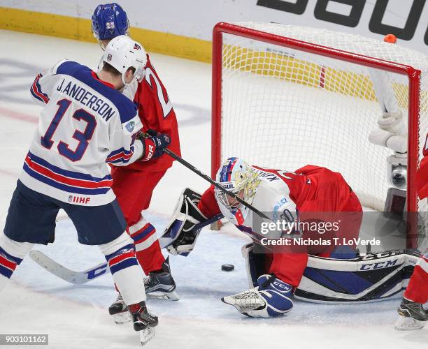 Joey Anderson of United States watches the puck slide into the net past Josef Korenar of Czech Republic during the second period of play in the IIHF...