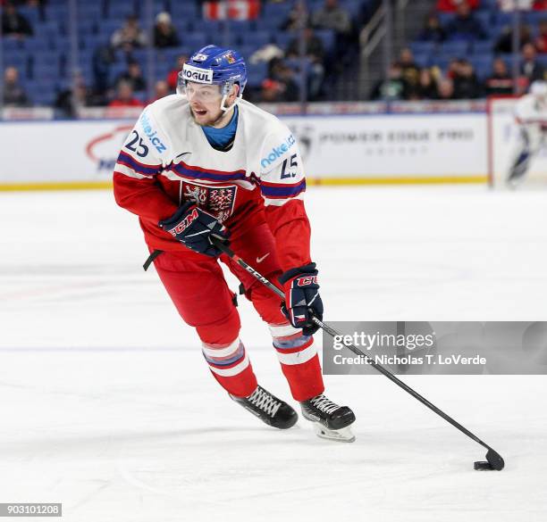 Radovan Pavlík of Czech Republic skates the puck against the United States during the third period of play in the IIHF World Junior Championships...