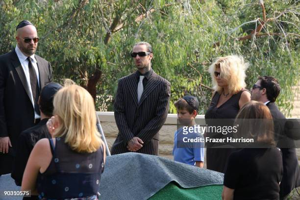 Musician Travis Barker and other friends and family attend the funeral of Adam Goldstein, otherwise known as DJ AM, at Hillside Memorial Park...