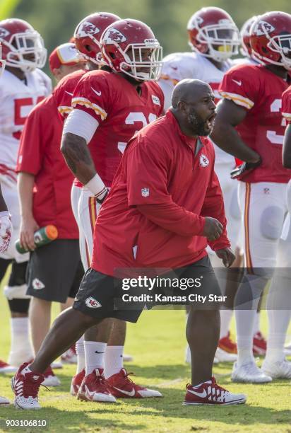 Kansas City Chiefs running backs coach Eric Bieniemy shouts during drills on August 4 during training camp practice at Missouri Western State...