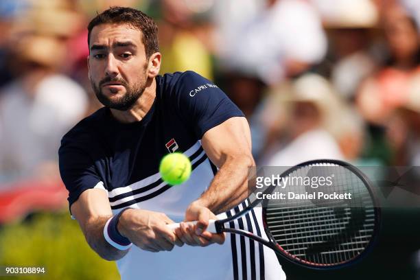 Marin Cilic of Croatia plays a backhand against Matt Ebden of Australia during the 2018 Kooyong Classic at Kooyong on January 10, 2018 in Melbourne,...