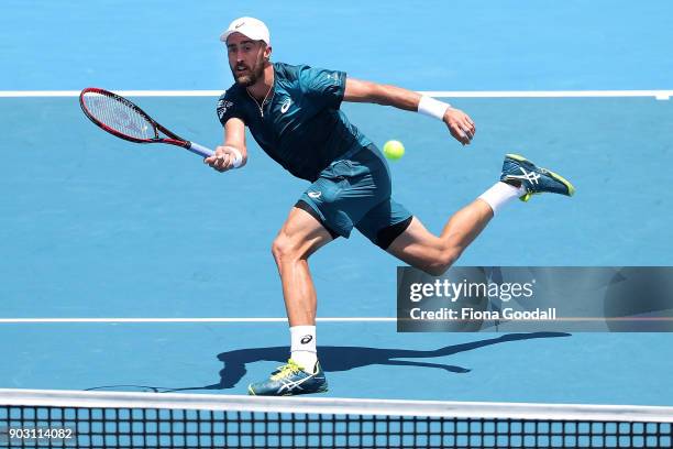 Steve Johnson of USA plays a forehand in his second round match against Roberto Bautista Agut of Spain during day three of the ASB Men's Classic at...