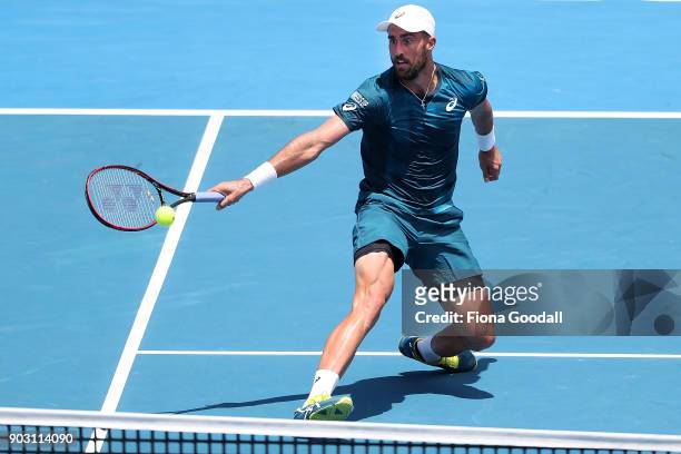 Steve Johnson of USA plays a forehand in his second round match against Roberto Bautista Agut of Spain during day three of the ASB Men's Classic at...