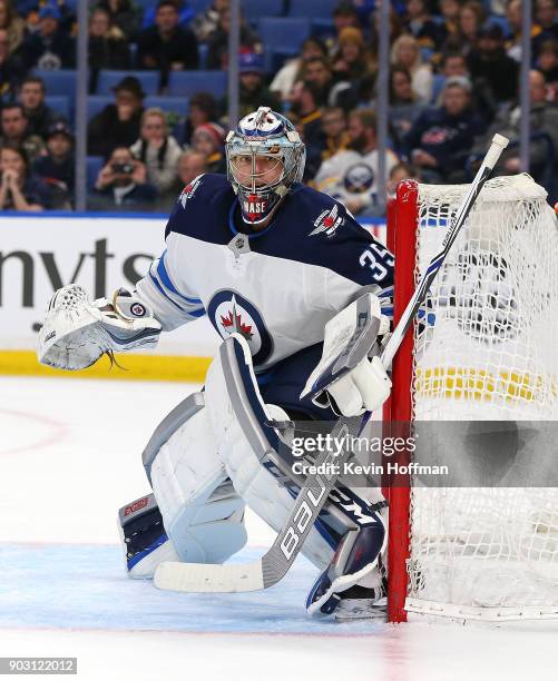 Steve Mason of the Winnipeg Jets tends net in the second period against the Buffalo Sabres at the KeyBank Center on January 9, 2018 in Buffalo, New...