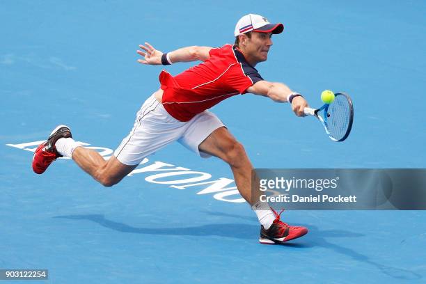 Matt Ebden of Australia plays a backhand against Marin Cilic of Croatia in the 2018 Kooyong Classic at Kooyong on January 10, 2018 in Melbourne,...