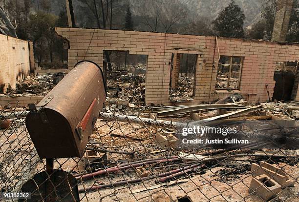 Mailbox sits in front of a home that was burned by the Station Fire September 2, 2009 at Vogel Flats near Tujunga, California. Fire officials said...