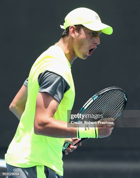 Andrew Whittington of Australia competes in his first round match against Michael Mmoh of United States during 2018 Australian Open Qualifying at...