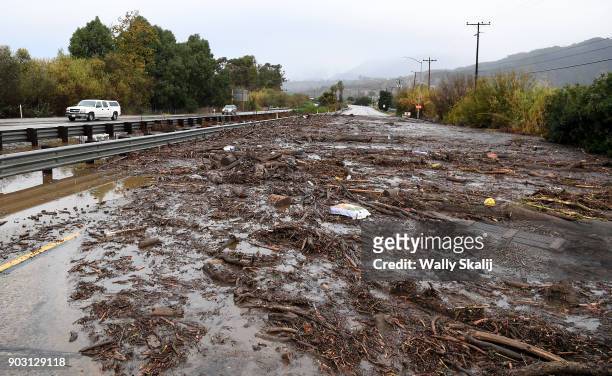 View of the Northbound 101 freeway in Carpenteria as mud sits along the road from a rain storm Tuesday January 9, 2018 in Carpenteria, California.