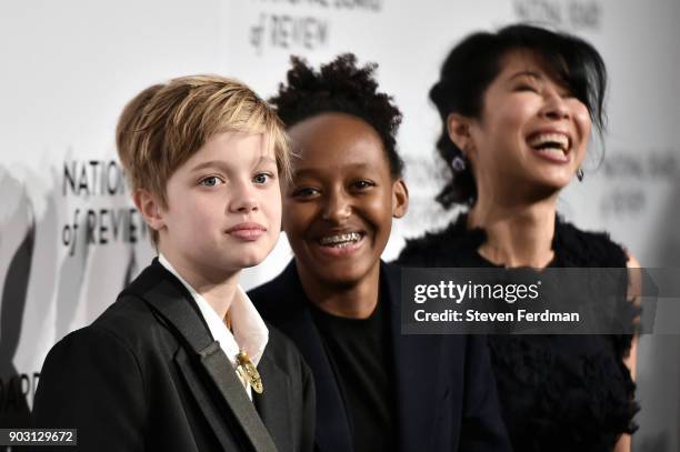 Shiloh Jolie-Pitt, Zahara Jolie-Pitt, and Loung Ung attend the 2018 The National Board Of Review Annual Awards Gala at Cipriani 42nd Street on...