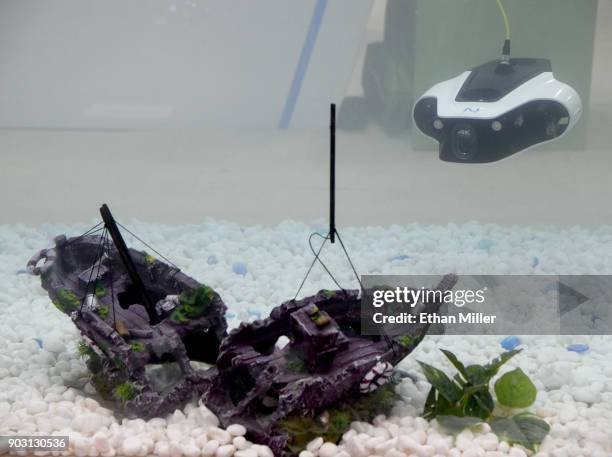 The Mito underwater robot by Navatics is demonstrated in a tank of water during CES 2018 at the Sands Expo and Convention Center on January 9, 2018...