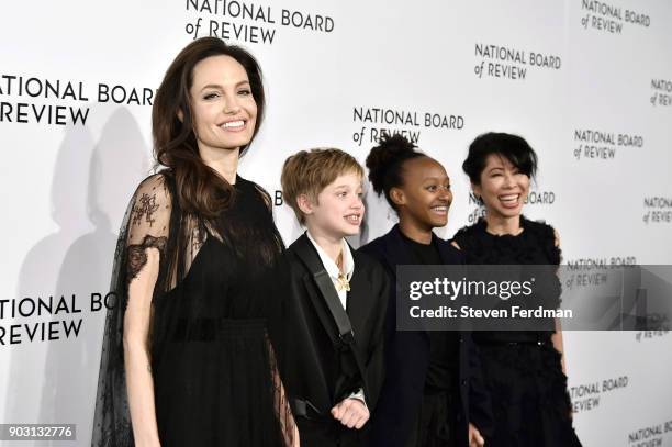 Angelina Jolie, Shiloh Jolie-Pitt, Zahara Jolie-Pitt, and Loung Ung attend the 2018 The National Board Of Review Annual Awards Gala at Cipriani 42nd...