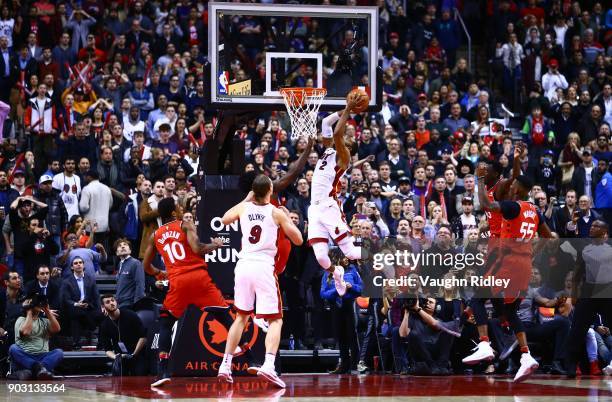 Wayne Ellington of the Miami Heat shoots the ball with seconds to go and Miami win the game late in the second half of an NBA game against the...