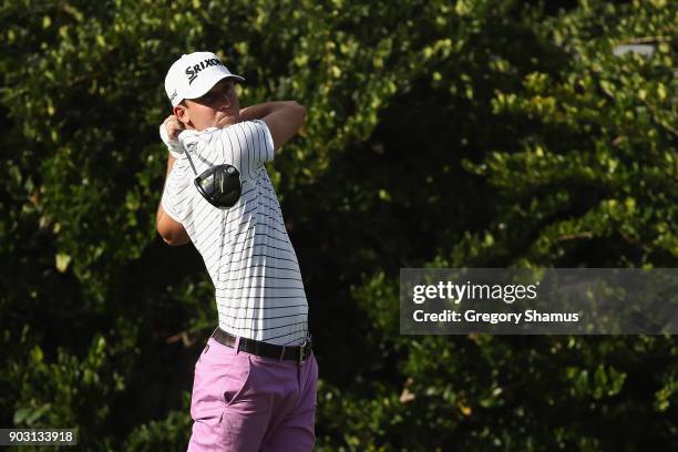 Smylie Kaufman of the United States plays a shot during practice rounds prior to the Sony Open In Hawaii at Waialae Country Club on January 9, 2018...