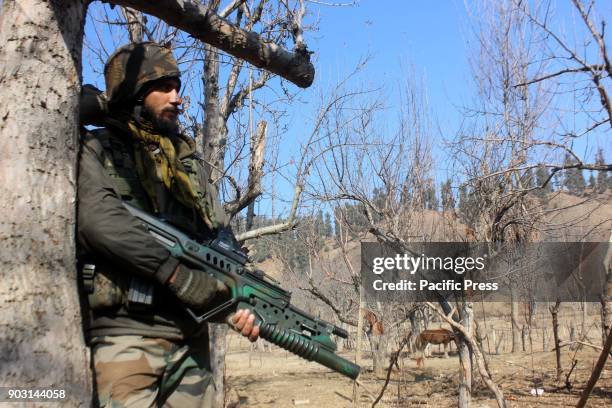 Police officer on the target site during the encounter with the rebels. There were two rebels & a civilian have been killed at Larnoo area of...
