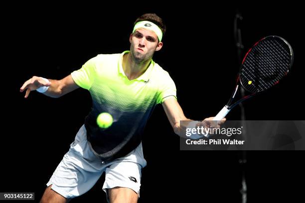 Jiri Vesely of the Czech Republic plays a backahand in his second round match against Sam Querrey of the USA on day three of the ASB Men's Classic at...