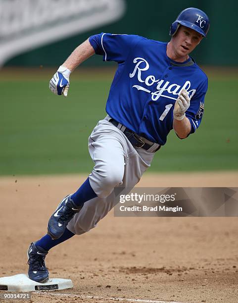 Josh Anderson of the Kansas City Royals rounds third base during the game against the Oakland Athletics at the Oakland-Alameda County Coliseum on...