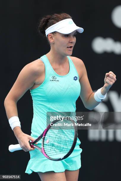 Agnieszka Radwanska of Poland celebrates winning match point in her second round match against Catherine Bellis of The United States during day four...