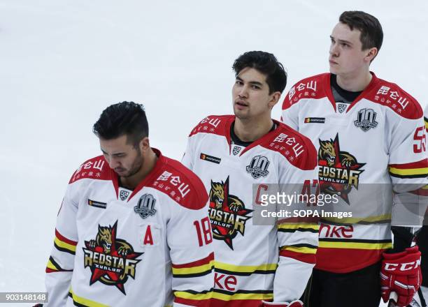 Brandon Yip, Cory Kane and Pavel Vorobei of HC Kunlun Red Star line up prior to the 2017/18 Kontinental Hockey League Regular Season match between HC...