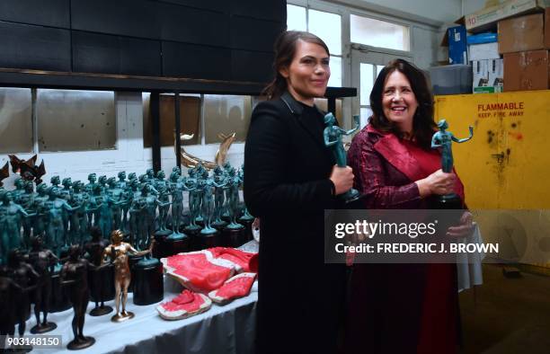 Clea Duvall and Ann Dowd pose with the statue known as 'the Actor' at the American Fine Arts Foundry on January 9, 2018 in Burbank, California where...
