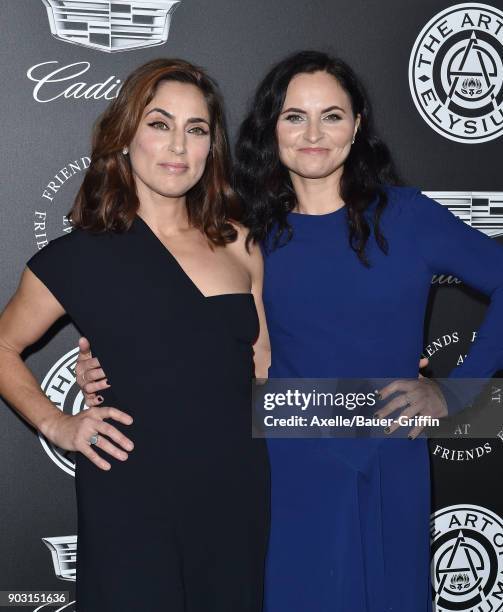 Actors Summer Phoenix and Rain Phoenix arrive at The Art of Elysium's 11th Annual Celebration - Heaven at Barker Hangar on January 6, 2018 in Santa...