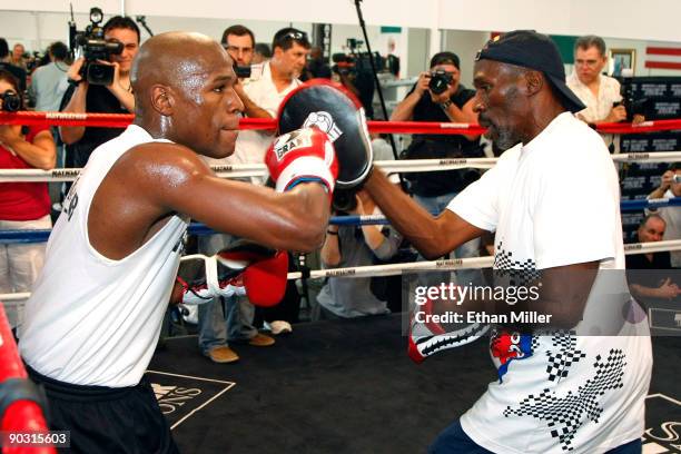 Boxer Floyd Mayweather Jr. Works out with his trainer and uncle Roger Mayweather September 2, 2009 in Las Vegas, Nevada. Mayweather will face Juan...