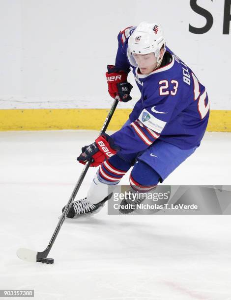 Kieffer Bellows of United States skates the puck against Sweden during the first period of play in the IIHF World Junior Championships Semifinal game...