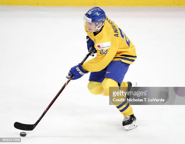 Lias Andersson of Sweden skates the puck against the United States during the first period of play in the IIHF World Junior Championships Semifinal...