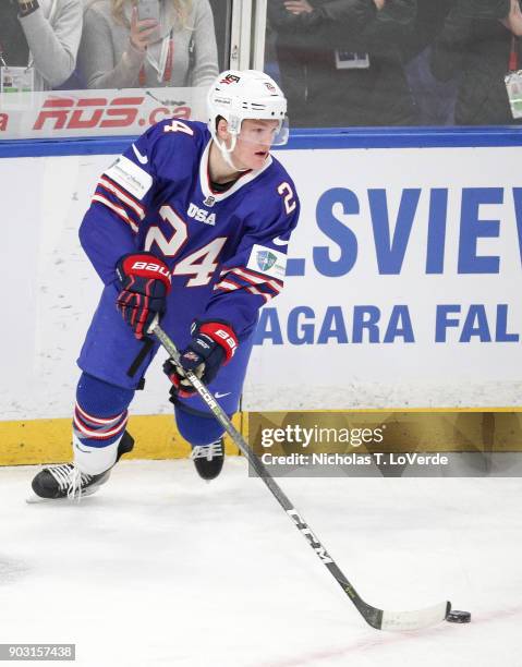 Mikey Anderson of United States skates the puck against Sweden during the second period of play in the IIHF World Junior Championships Semifinal game...