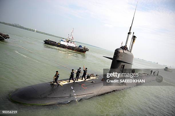 French-made Malaysia's first submarine reaches its Naval base in Port Klang on the outskirts of Kuala Lumpur on September 3, 2009. Malaysia's first...
