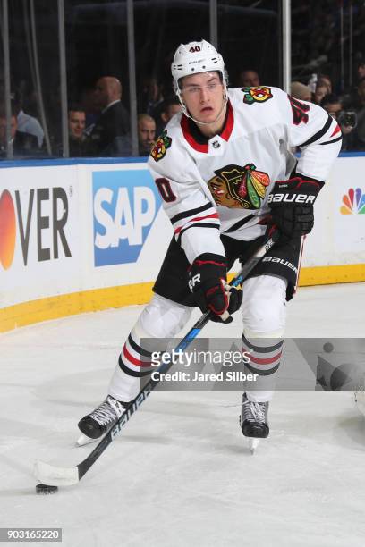 John Hayden of the Chicago Blackhawks skates with the puck against the New York Rangers at Madison Square Garden on January 3, 2018 in New York City.