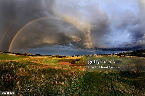 Rainbow on a very stormy evening on the par 5, 14th hole which shares it's green with the 4th hole is protected by the famous 'Hell Bunker' on the...