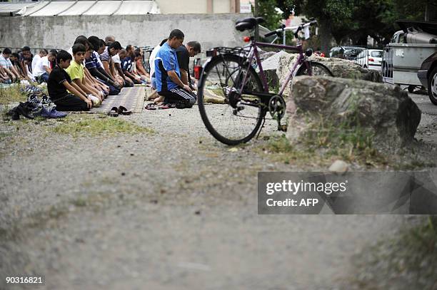 Muslims pray outside the An-Nour mosque, on September 2, 2009 during the ramadan. A new mosque should be built in Mulhouse and another in Strasbourg...