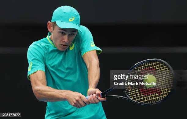 Alex de Minaur of Australia plays a backhand in his second round match against Damir Dzumhur of Bosnia and Herzegovinia during day four of the 2018...