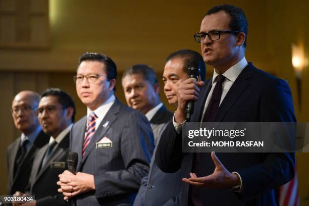 Of Ocean Infinity Limited Oliver Plunkett speaks during a press conference after a signing ceremony to resume the search for missing Malaysia...