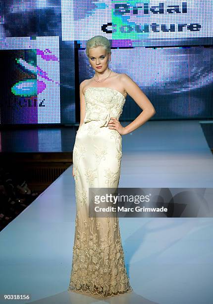 Model showcases designs by Darb Bridal Couture on the catwalk at the Mercedes-Benz Group Show 5 show as part of Mercedes-Benz Fashion Festival...