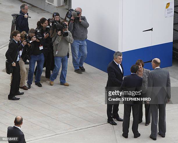 Britain's Prime Minister Gordon Brown arrives for a cabinet meeting near the Aquatic Centre construction site at the London 2012 Olympic village in...