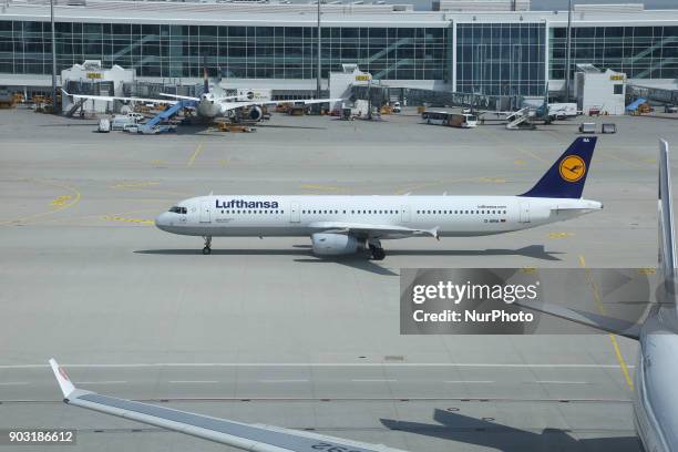 Outdoor images of the terminal, the control tower, aircraft and movements of Munich international airport, in Germany. Munich is the 15th busiest...