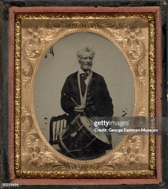 Portrait of an elderly man as marching drummer, possibly a soldier during the American Civil War, ca. 1863.