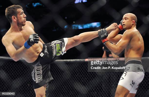 Fighter Kenny Florian battles UFC fighter BJ Penn during their Lightweight Championship fight at UFC 101: Declaration at the Wachovia Center on...