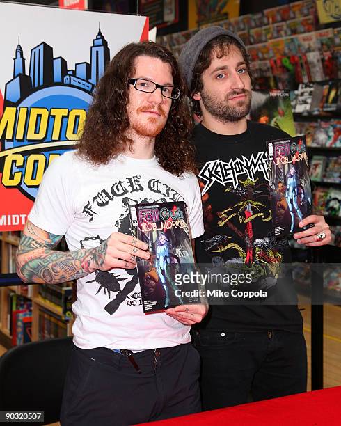 Drummer Andy Hurley and lead guitarist Joe Trohman of Fall Out Boy promotes "FOB Presents Fall Out Toy Works" at Midtown Comics on September 3, 2009...