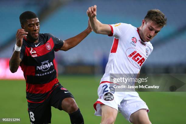 Roly Bonevacia of the Wanderers and Ryan Strain of Adelaide compete for the ball during the round 15 A-League match between the Western Sydney...